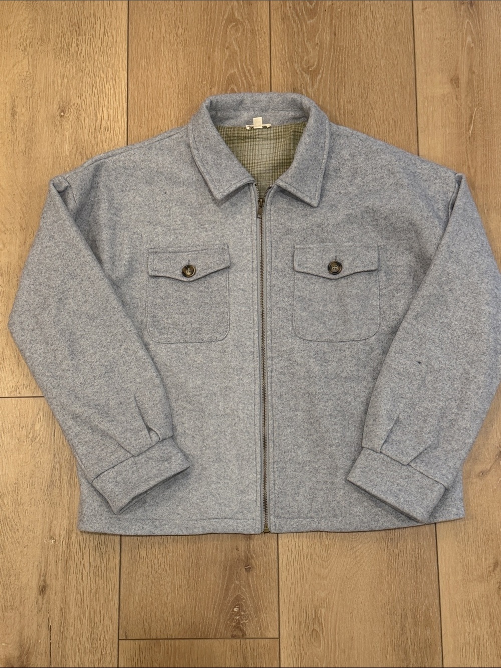 Woman’s Light Gray Zip Jacket